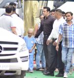 Salman Khan snapped as he meets a special child at Mehboob Studio on 28th May 2014